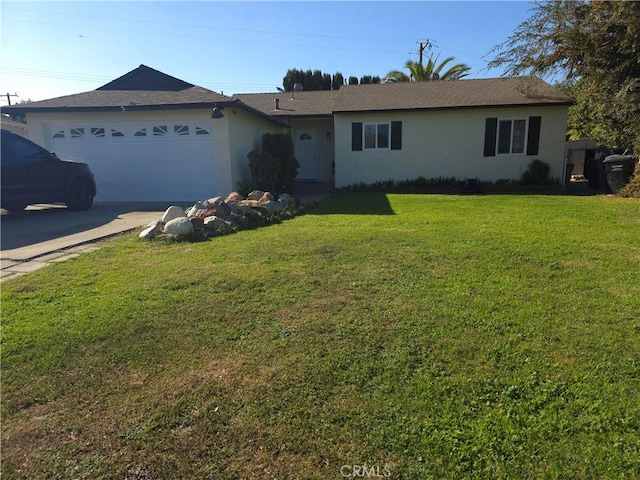 single story home with a garage and a front lawn