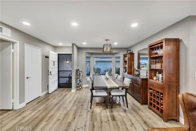 dining room featuring light wood-type flooring