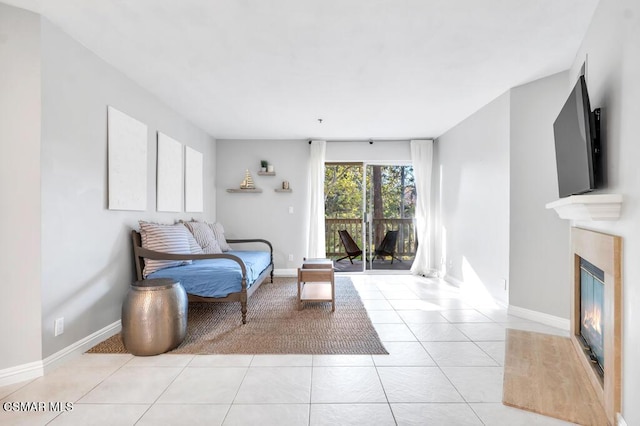 living area with light tile patterned floors