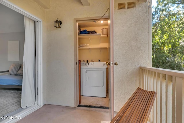 laundry room featuring independent washer and dryer