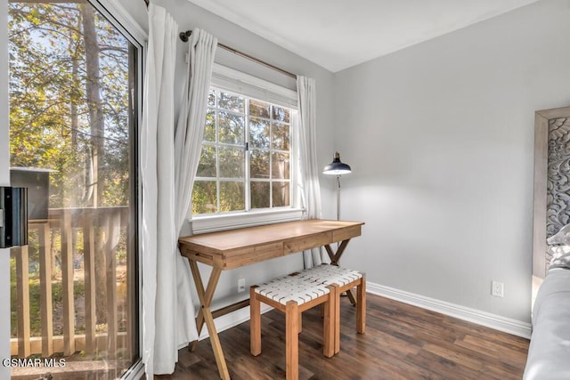 dining space with dark wood-type flooring