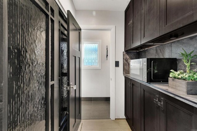 kitchen with dark brown cabinets