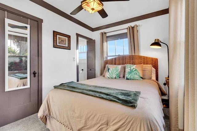 bedroom with ceiling fan, a closet, and carpet