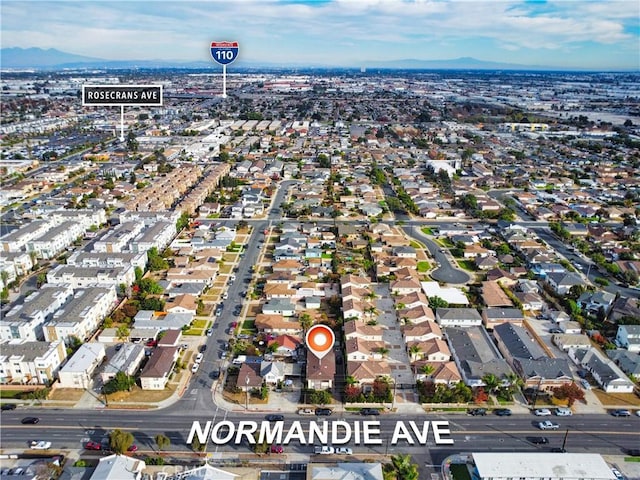 birds eye view of property with a residential view and a mountain view