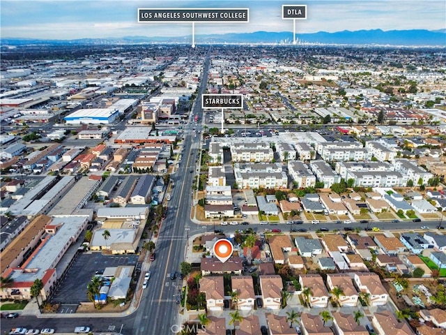 aerial view with a residential view and a mountain view