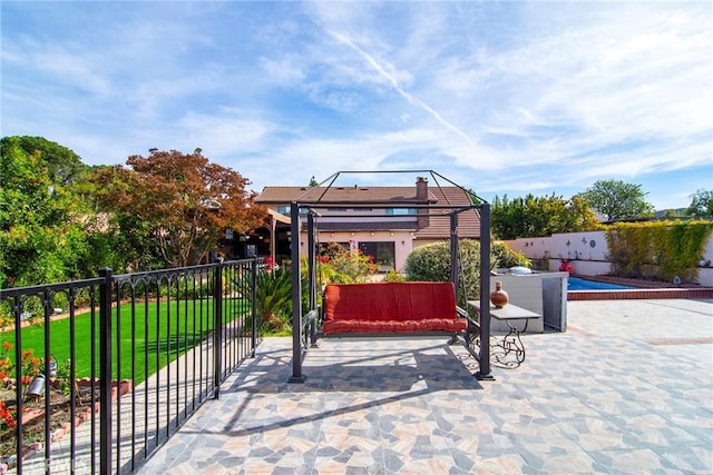 view of patio / terrace with a swimming pool