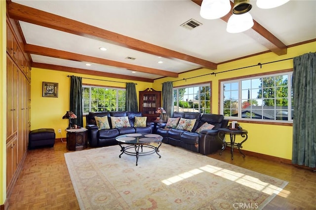 living room featuring ceiling fan, beam ceiling, and parquet floors