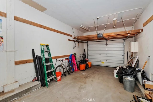 garage featuring a garage door opener