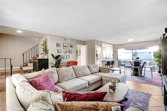 living room with light tile patterned flooring