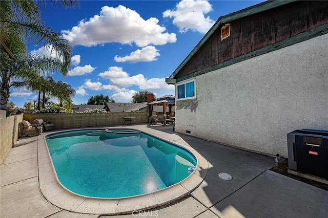 view of pool featuring a gazebo and a patio