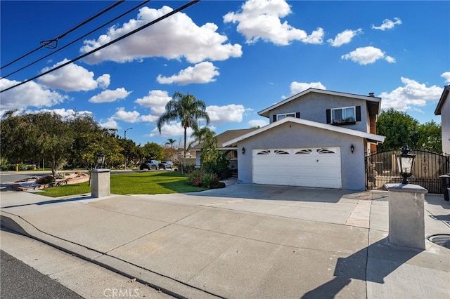 view of front of property with a garage and a front yard