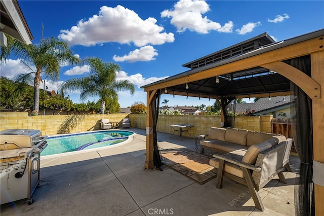 view of pool featuring a patio area, a gazebo, an outdoor hangout area, and a grill