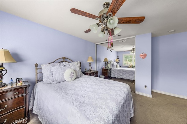 carpeted bedroom featuring ceiling fan