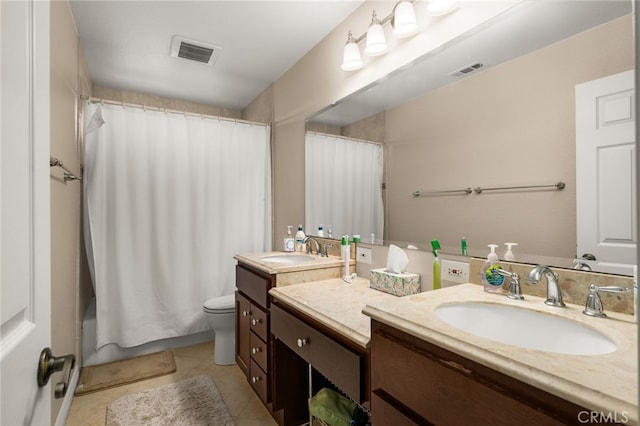 full bathroom with shower / bathtub combination with curtain, tile patterned flooring, vanity, and toilet