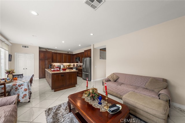 living room featuring light tile patterned flooring