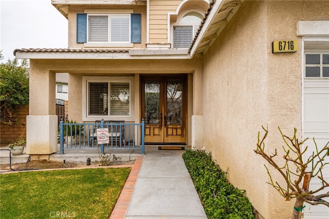 property entrance featuring covered porch