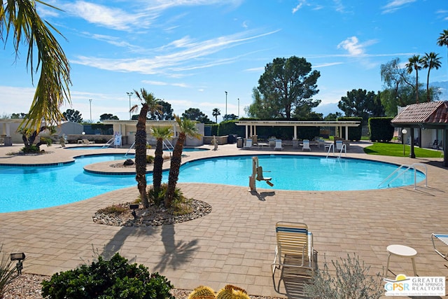 view of pool with a patio area