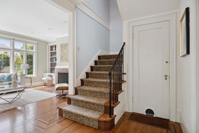 stairway with wood-type flooring