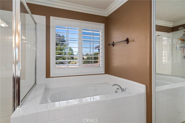 bathroom with separate shower and tub and crown molding