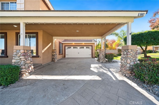 view of side of home featuring a garage