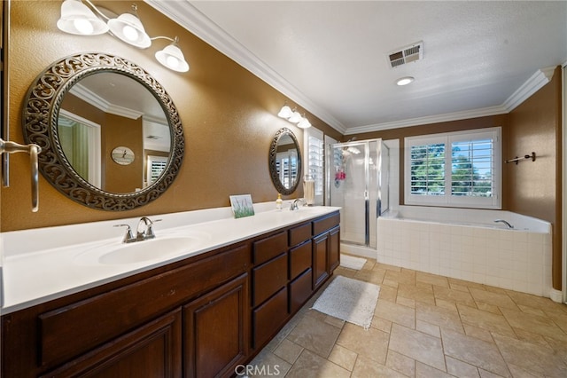 bathroom featuring vanity, separate shower and tub, ornamental molding, and a textured ceiling