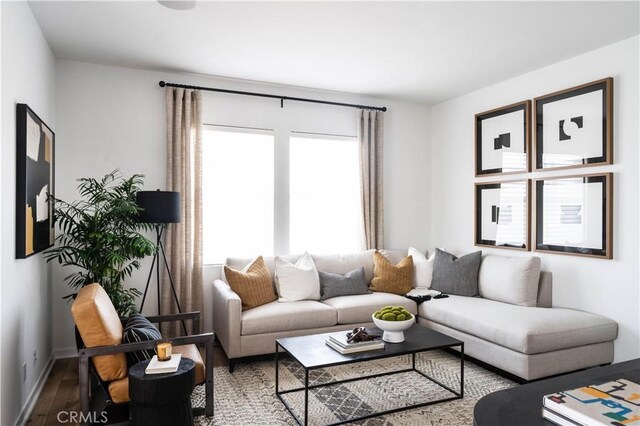 1752 W Sycamore Dr, Compton, CA 90220 - living room with plenty of natural light and wood finished floors