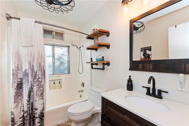 full bathroom with shower / bath combo with shower curtain, vanity, and toilet