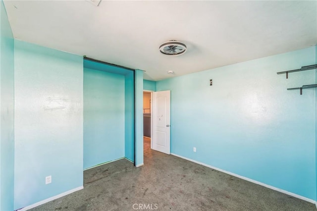 unfurnished bedroom featuring light colored carpet