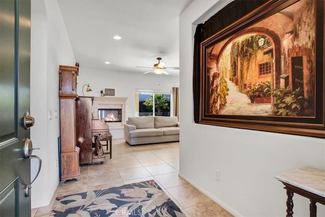 hall featuring light tile patterned floors