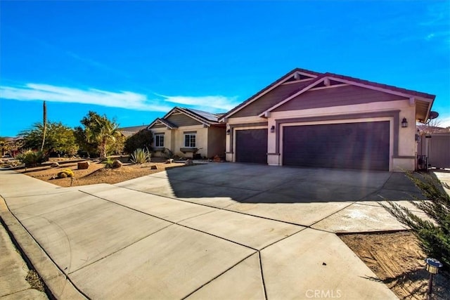 single story home with a garage