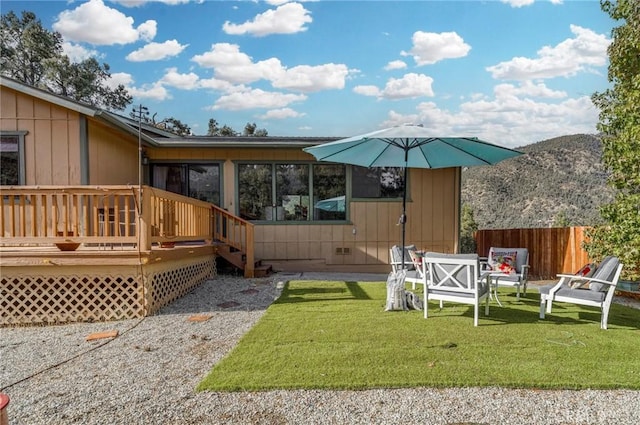 exterior space featuring a yard and fence