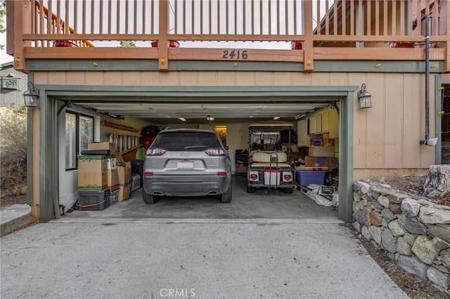 garage featuring driveway