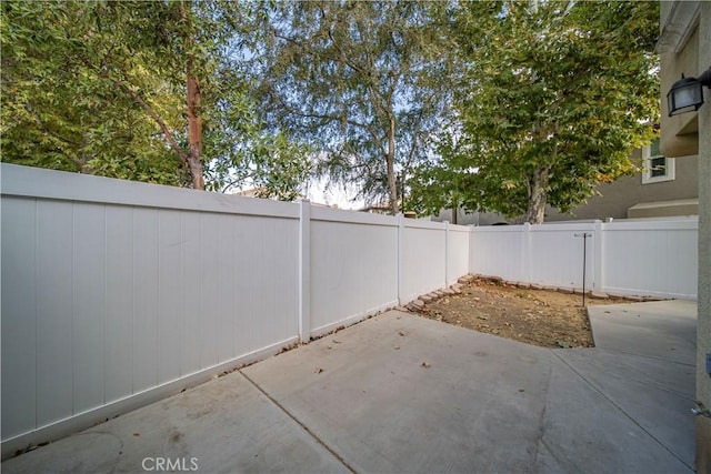 view of patio with a fenced backyard