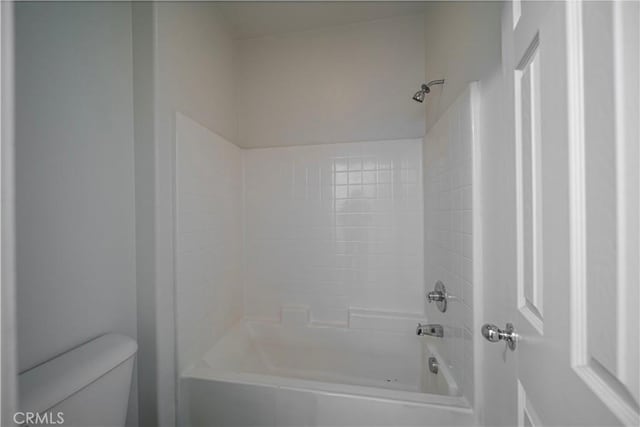 bathroom with  shower combination and toilet