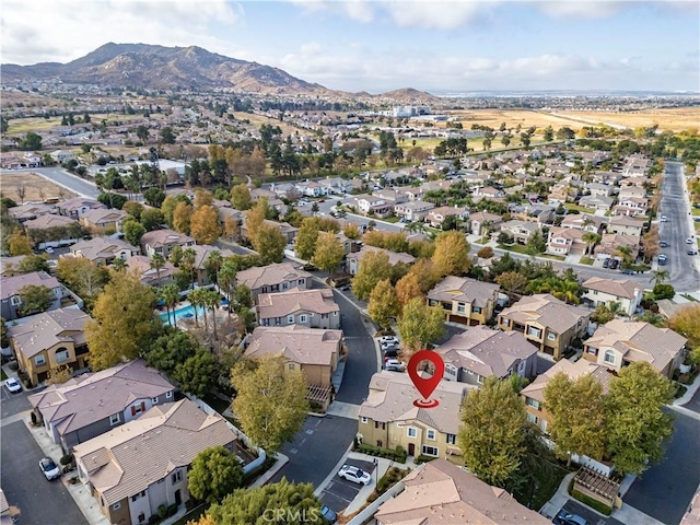 birds eye view of property featuring a residential view and a mountain view