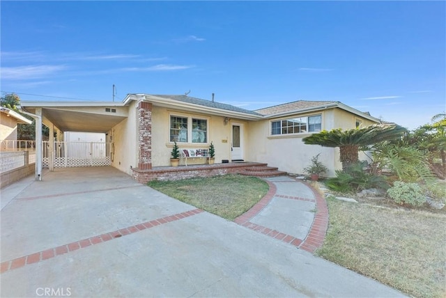 view of front facade with a carport