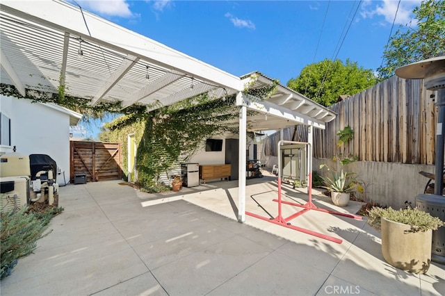 view of patio / terrace featuring a pergola