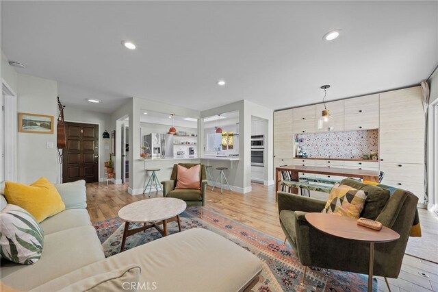 living room featuring light wood-type flooring