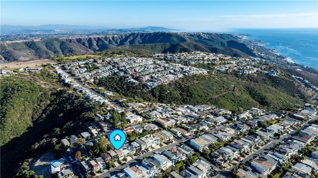 drone / aerial view featuring a mountain view