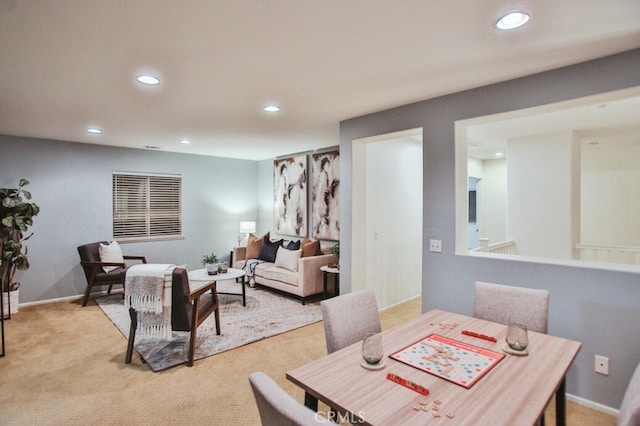 view of carpeted dining area