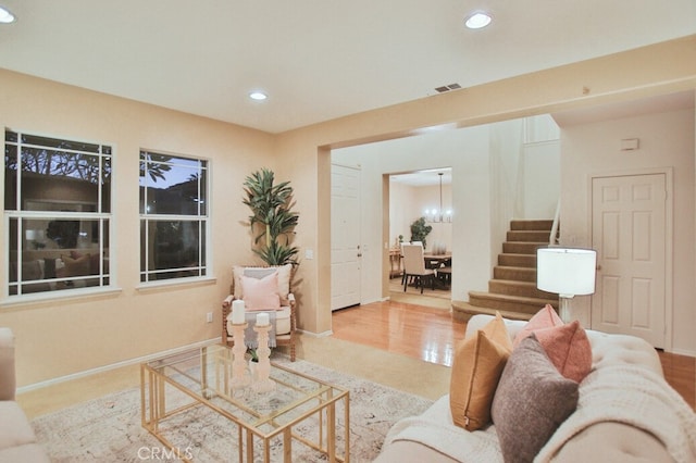 living room with light hardwood / wood-style flooring