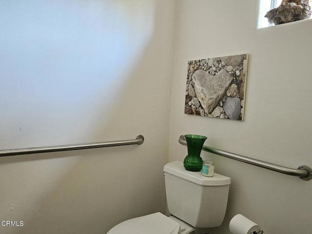 bathroom featuring toilet