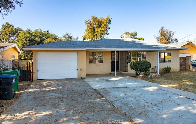 ranch-style home featuring a garage