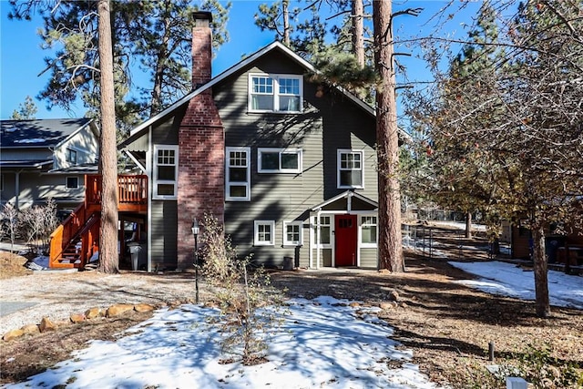 view of front of house with a wooden deck