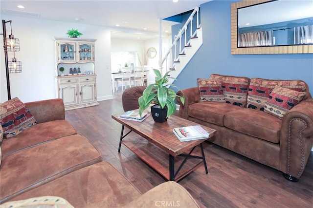 living room with dark hardwood / wood-style floors