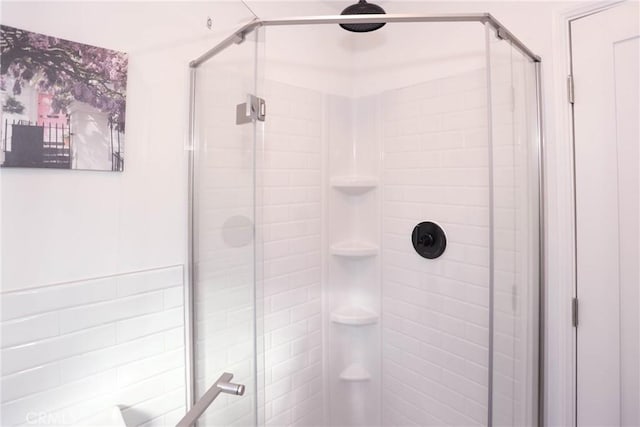 bathroom with an enclosed shower