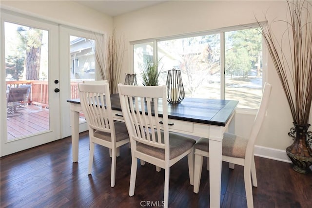 dining room with dark wood-type flooring