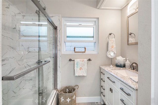 bathroom with vanity and walk in shower