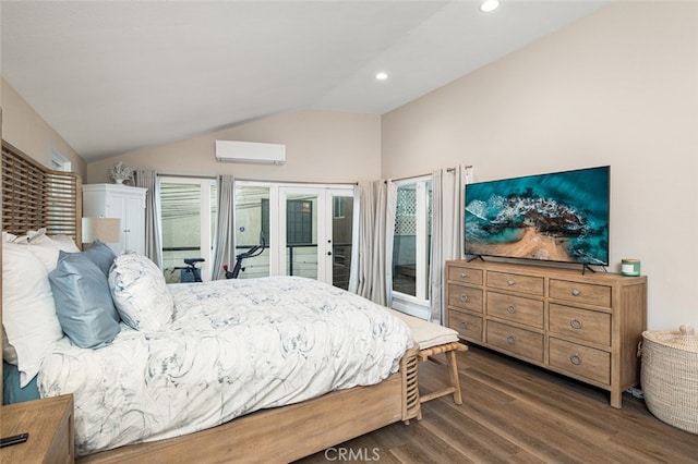 bedroom with vaulted ceiling, dark hardwood / wood-style floors, and a wall mounted air conditioner