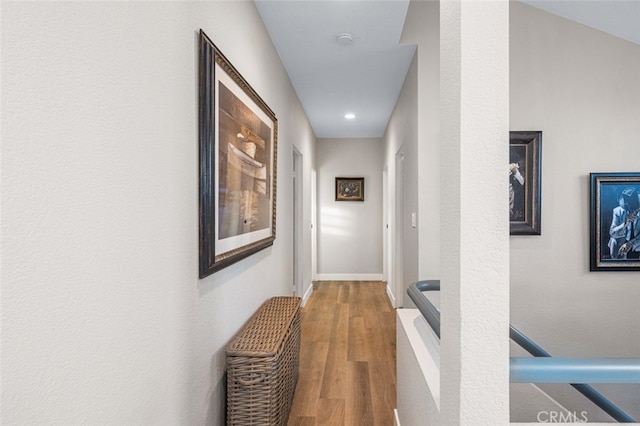 corridor featuring hardwood / wood-style flooring